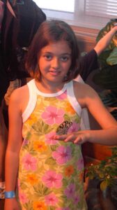 Me at 10 years old, holding a butterfly at the Milwaukee Public Museum.